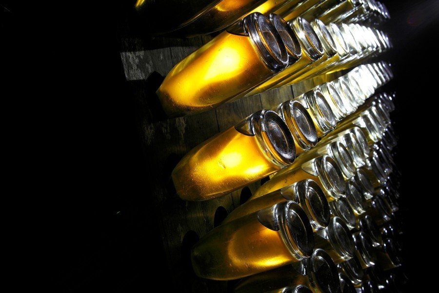 Louis Roederer Cristal bottles on the riddling rack